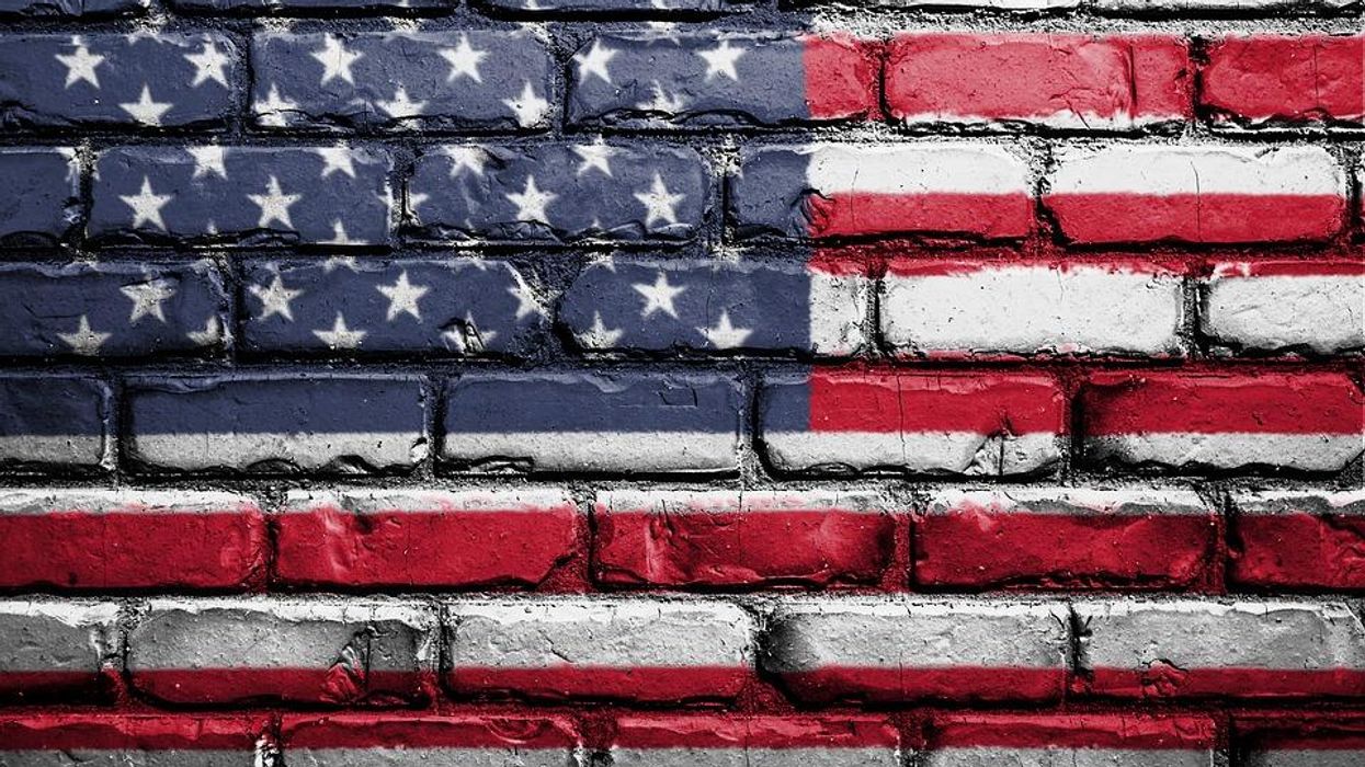 American flag painted on brick wall