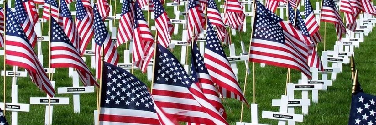 American flags and small crosses