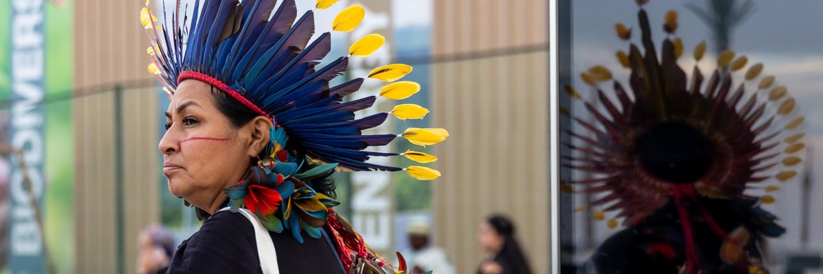 American Indigenous woman standing in the Delegations Pavilions area during of the COP27 UN Climate Change Conference, held by UNFCCC in Sharm El-Sheikh International Convention Center, Egypt on November 14, 2022.