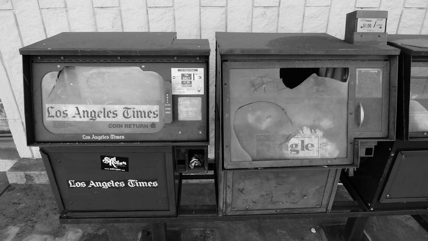 An abandoned LA Times kiosk. 