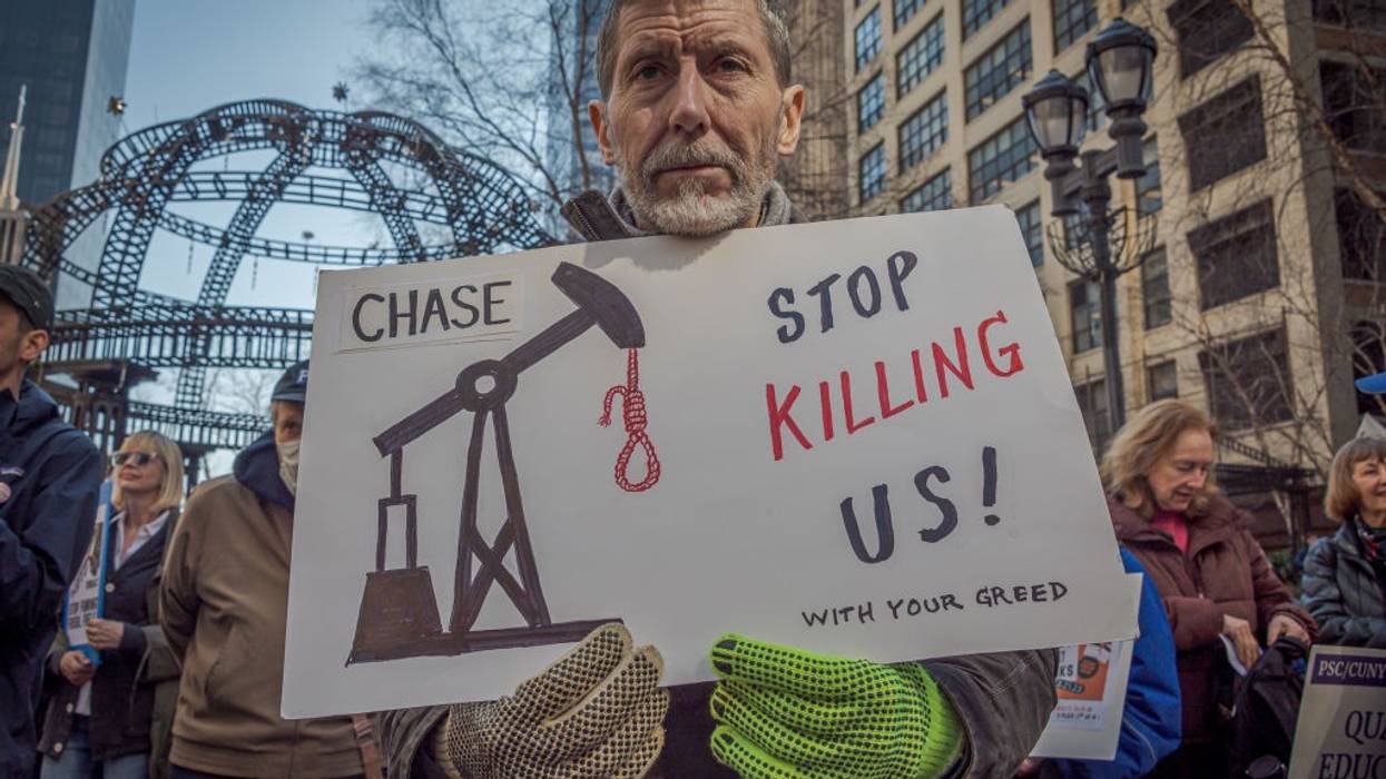 An activist holds a sign in New York City