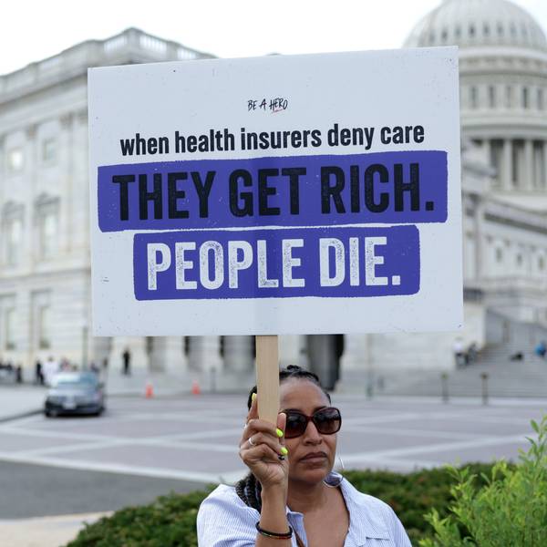 An advocate holds a sign during a news conference on Medicare Advantage plans in front of the US Capitol