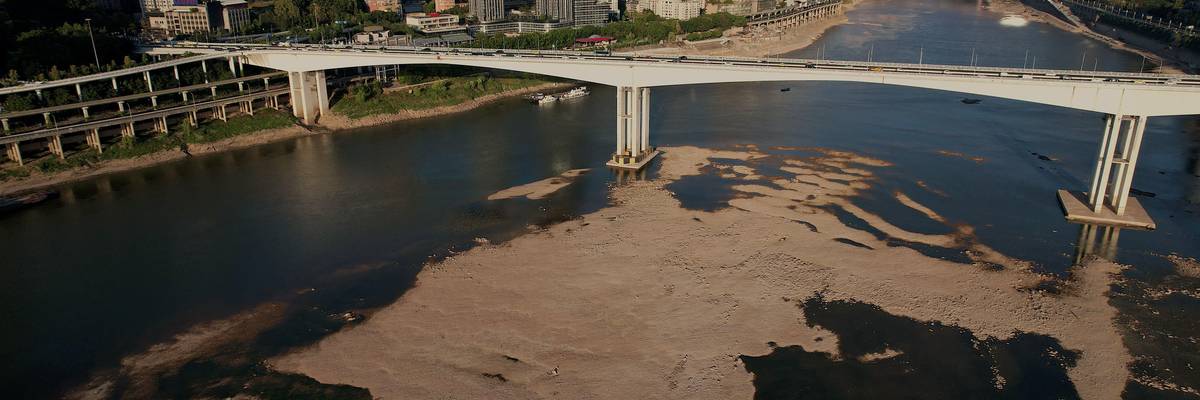 An aerial picture taken on August 24, 2022 shows the riverbed of the Jialing River, a tributary of the Yangtze River, in China's southwestern city of Chongqing.