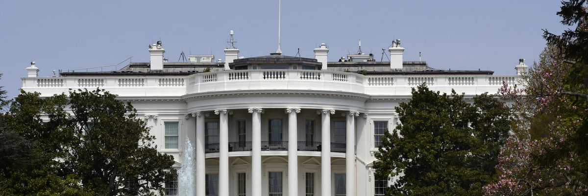 An American flag flies over the south facade of the White House in Washington, D.C.