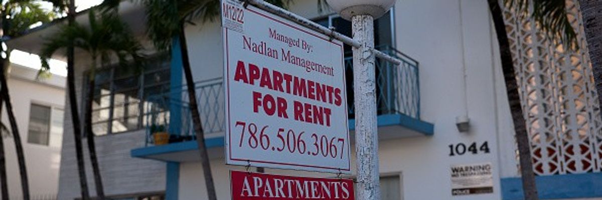 An 'Apartments for Rent' sign