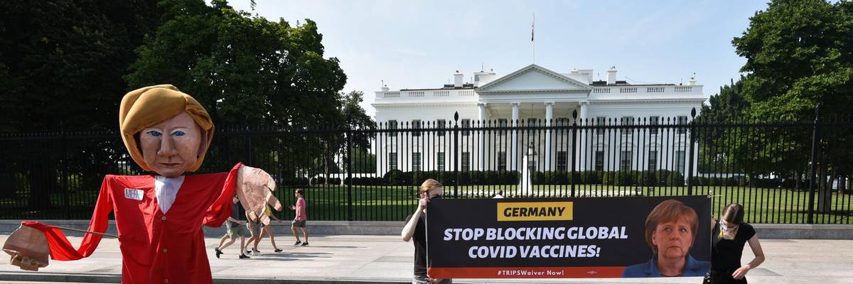 An effigy of German Chancellor Angela Merkel is displayed during a protest calling for the suspension of intellectual property barriers to facilitate the increased production of Covid-19 vaccines, at Lafayette Square in front of the White House in Washington, D.C. on July 15, 2021. (Photo: Mandel Ngan/AFP via Getty Images)