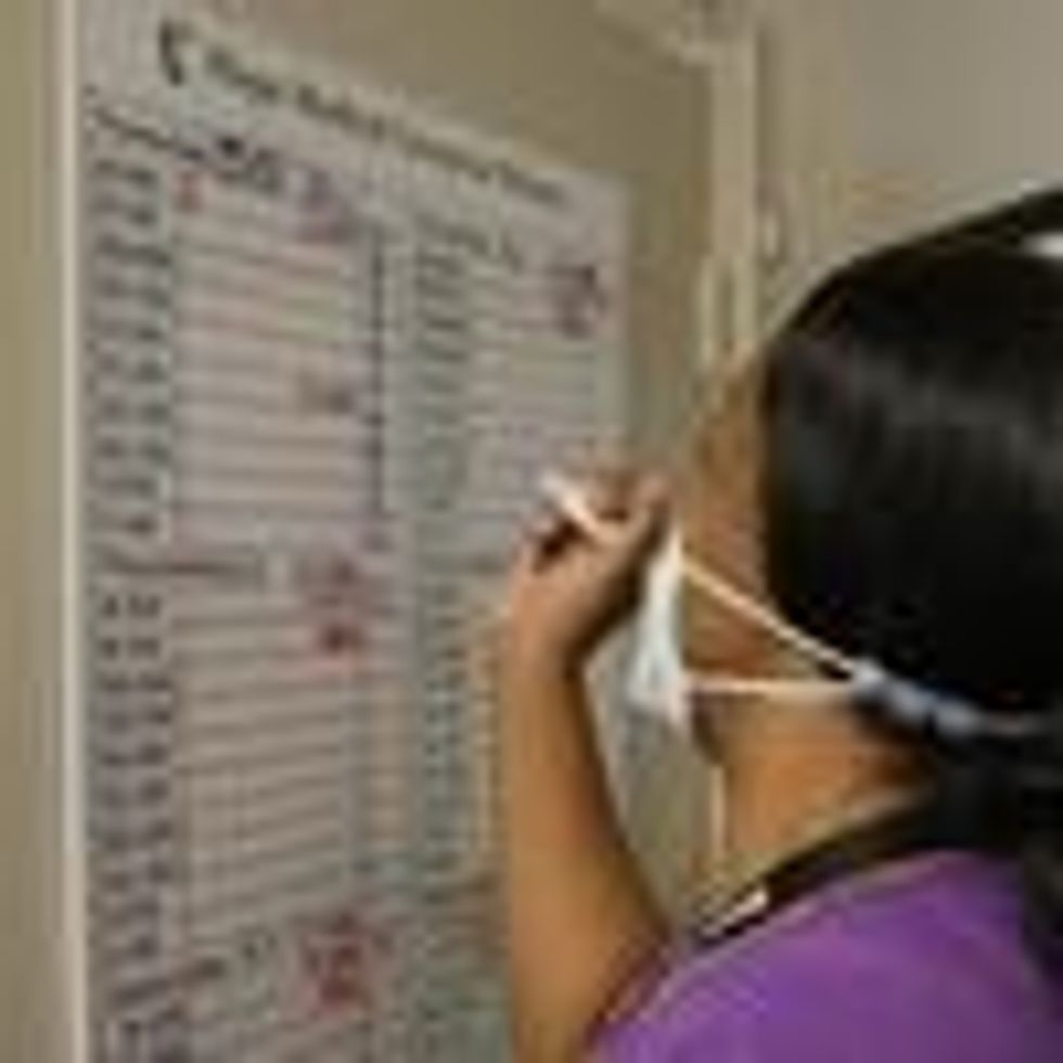 An employee at Hope Medical Group logs codes