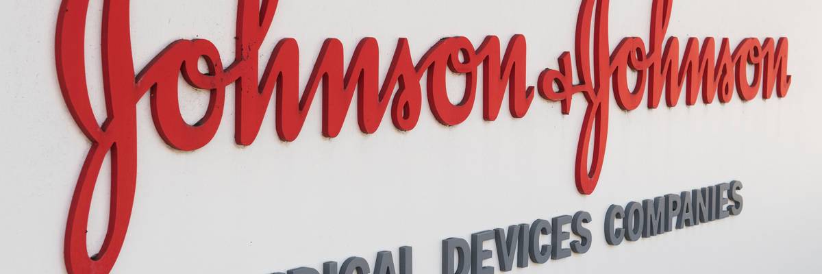 An entry sign to the Johnson & Johnson campus shows their logo in Irvine, California