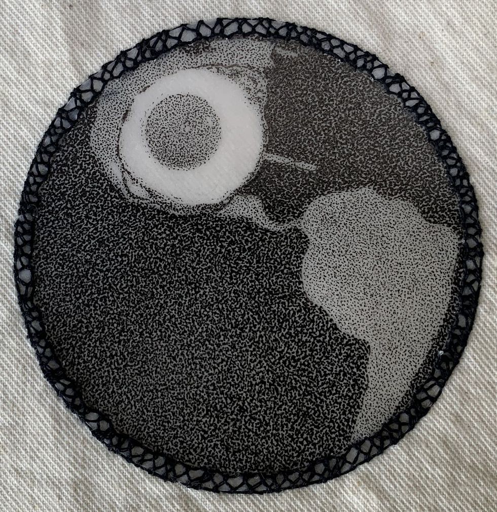 An image of a frying pan showing North and South America, with an egg frying over the U.S. and Mexico.