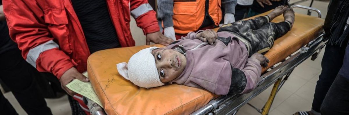 An injured child on stretcher in Gaza