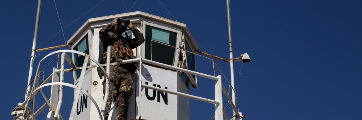 An Italian U.N. peacekeeper mans a watchtower in southern Lebanon