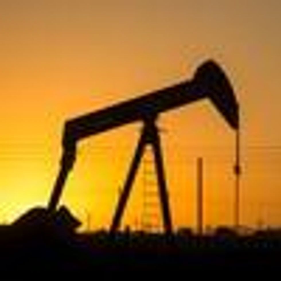 An oil pumpjack is silhouetted against the morning sunrise on July 8, 2021, north of Bakersfield, California.