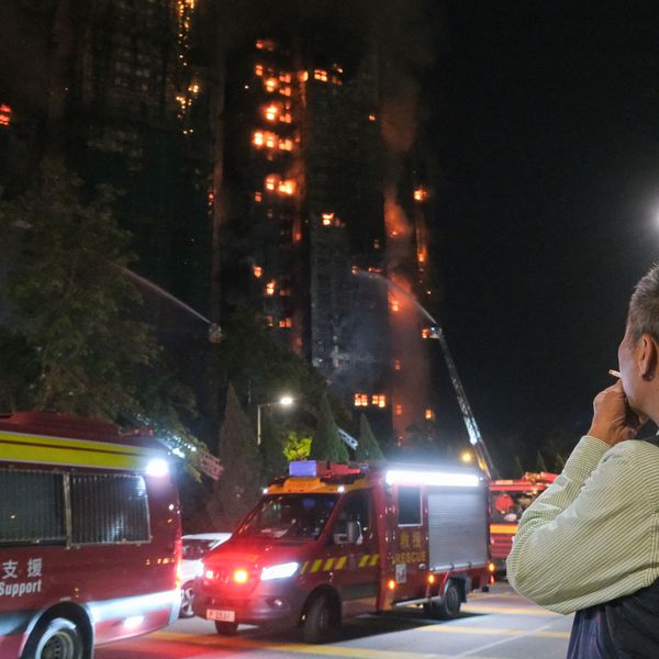 Criminal Probe Underway as Hong Kong Tower Fire Leaves Dozens Dead and Hundreds Missing