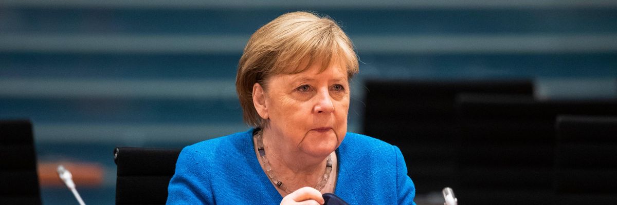 Angela Merkel arrives at a cabinet meeting