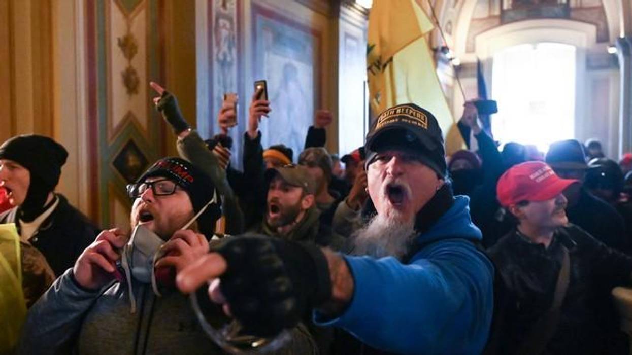 Angry Trump supporters swarm through the halls of the U.S. Capitol on January 6, 2021.