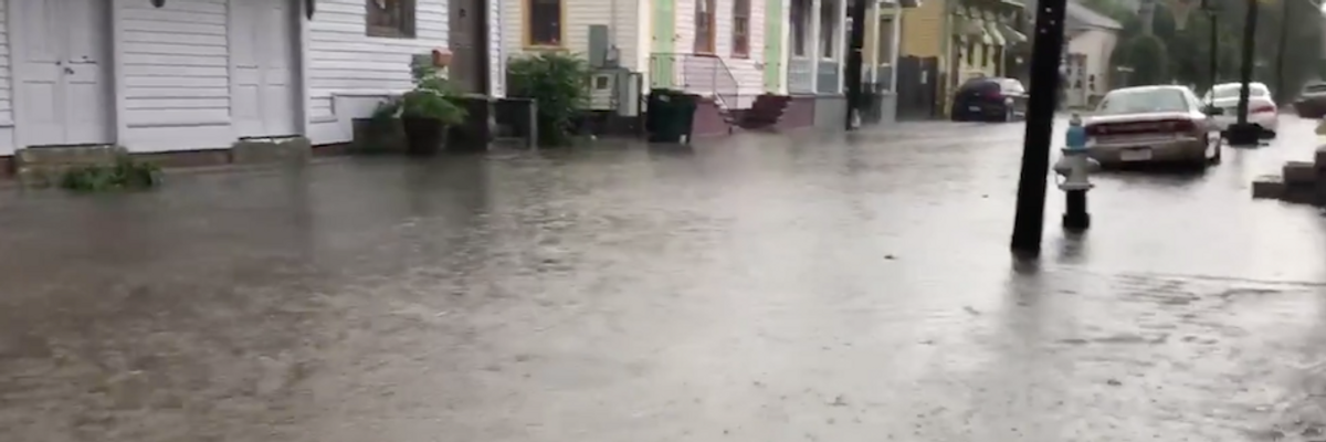 Days Before Hurricane Expected to Hit New Orleans, City Endures 10 Inches of Rain as Mississippi River Swells