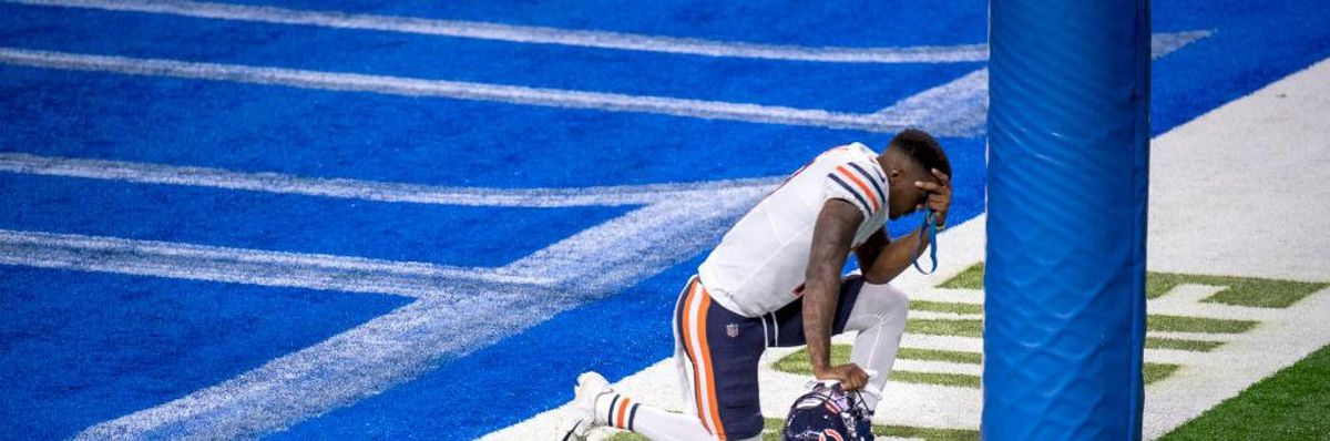 Anthony Miller #17 of the Chicago Bears kneels in the end zone before the game against the Detroit Lions at Ford Field on September 13, 2020 in Detroit, Michigan