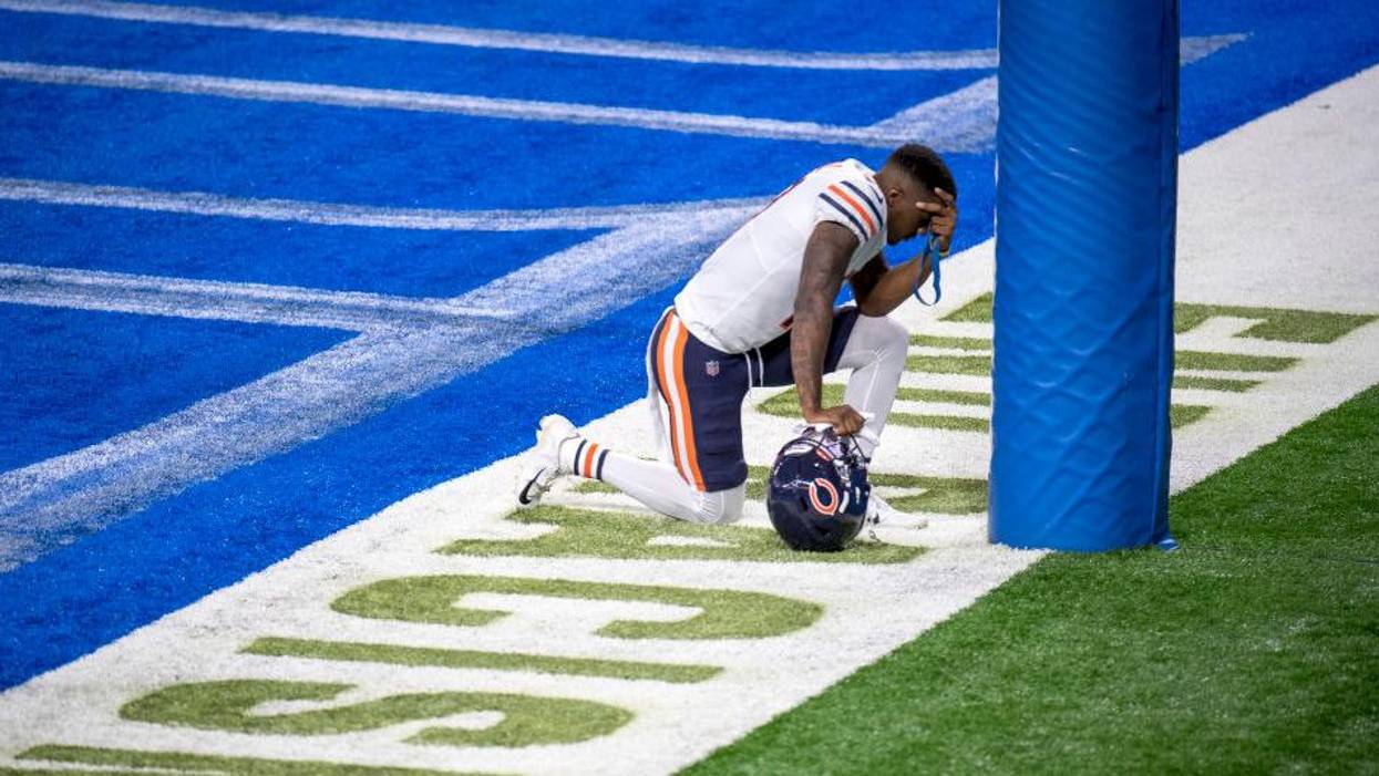 Anthony Miller #17 of the Chicago Bears kneels in the end zone before the game against the Detroit Lions at Ford Field on September 13, 2020 in Detroit, Michigan