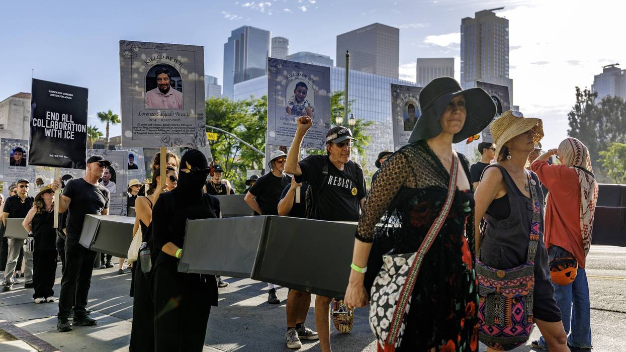 Anti-ICE protesters carry cardboard coffins in downtown Los Angeles