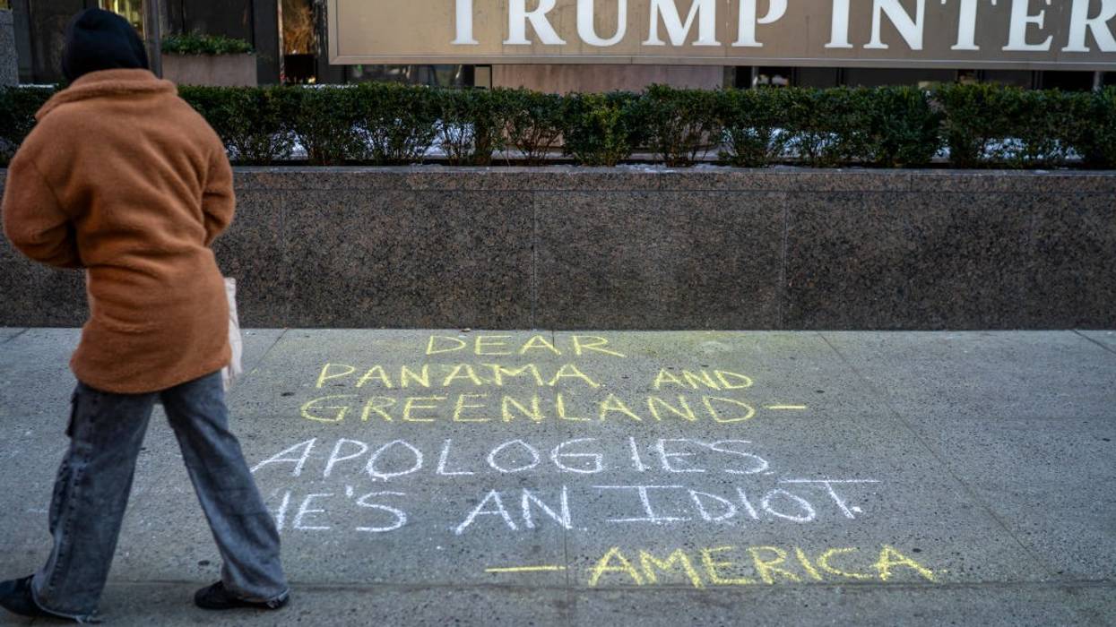 anti-Trump graffiti on a New York sidewalk