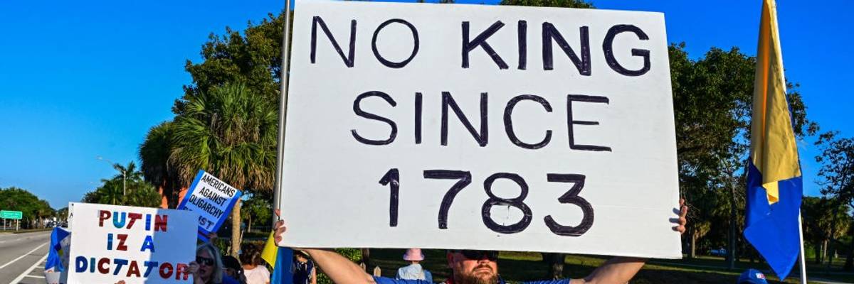 Anti-Trump signs says "No King Since 1783"