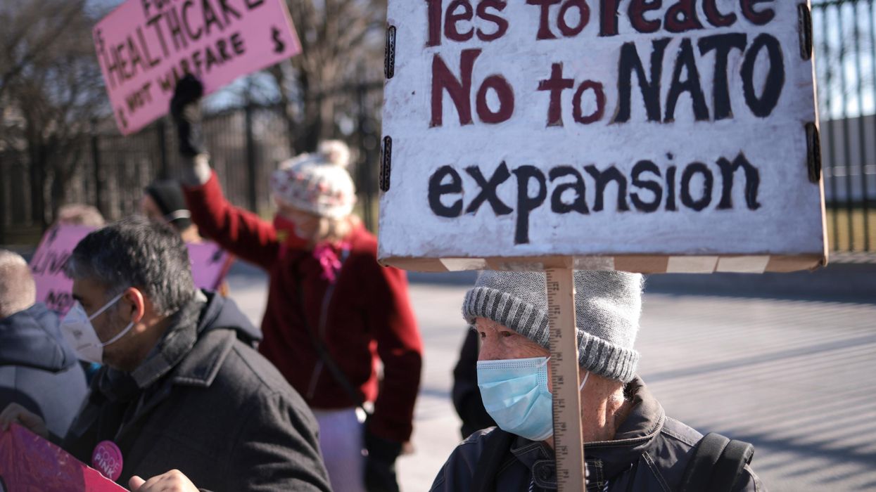 Anti-war protesters demonstrate outside the White House