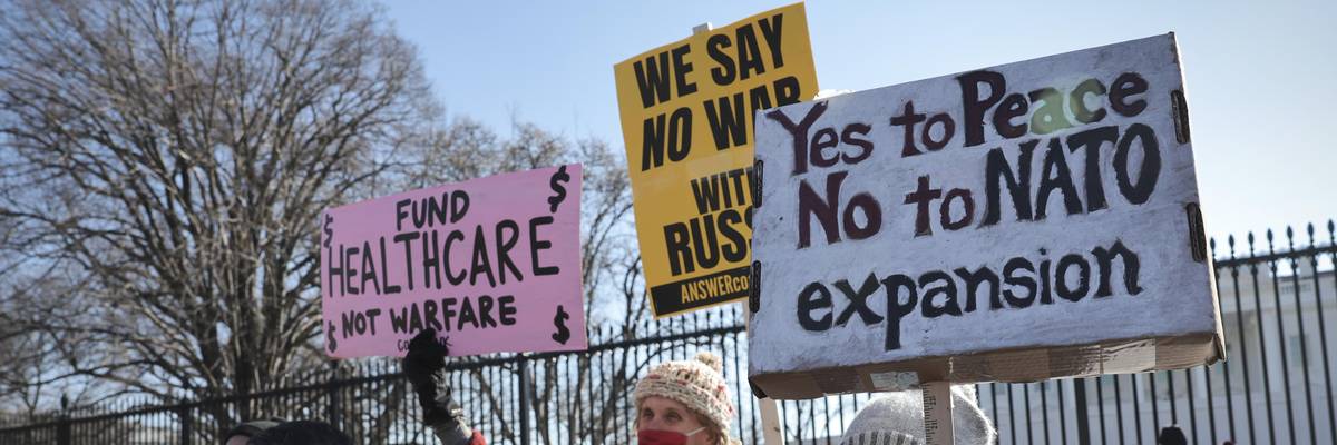 Anti-war protesters gather in front of the White House to demonstrate against escalating tensions between the United States and Russia over Ukraine on January 27, 2022, in Washington, D.C.