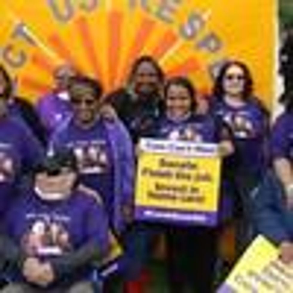 April Verrett, president of Service Employees International Union Local 2015 (center), and supporters attend a rally to urge Congress to protect Medicaid and invest in home care on May 5, 2022 in Washington, D.C.