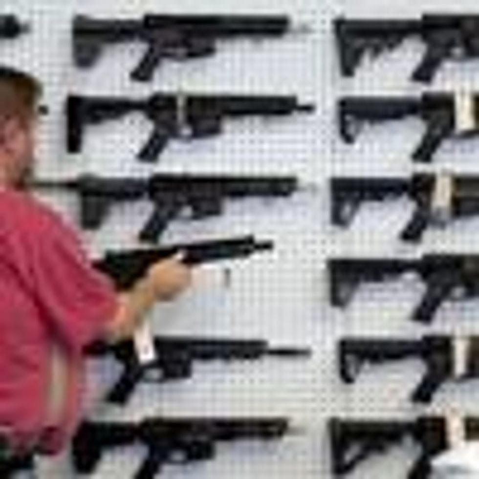 AR-15 assault rifles on display in a gun store