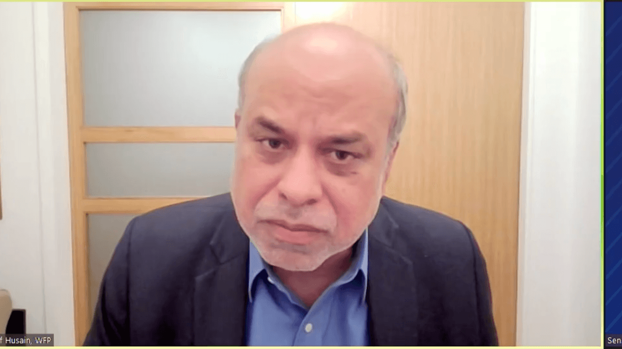 Arif Husain and Bernie Sanders