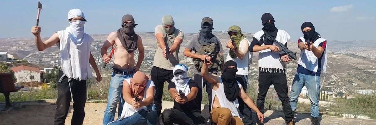 armed Israeli settlers threaten violence