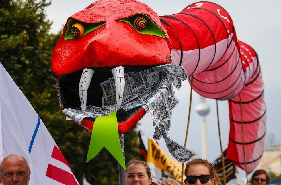 Around 250,000 people were expected to turn out for protests in seven German cities (AFP Photo/Odd Andersen)