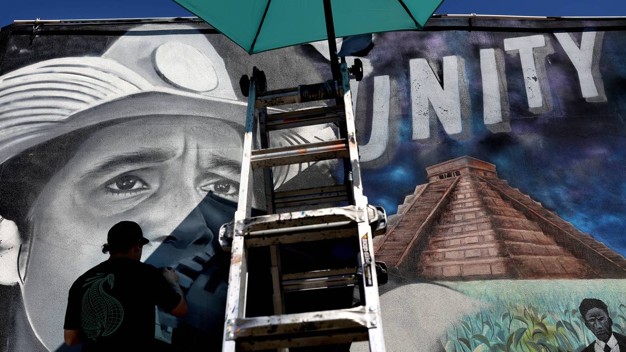 Artist MisterAlek erased Cesar Chavez mural and replaces it with Delores Huerta mural.