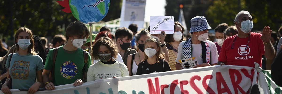 As diplomats gathered in Milan for a Pre-COP 26 meeting, hundreds of people participated in a Fridays For Future climate march on October 1, 2021. (Photo: Stefano Guidi via Getty Images)