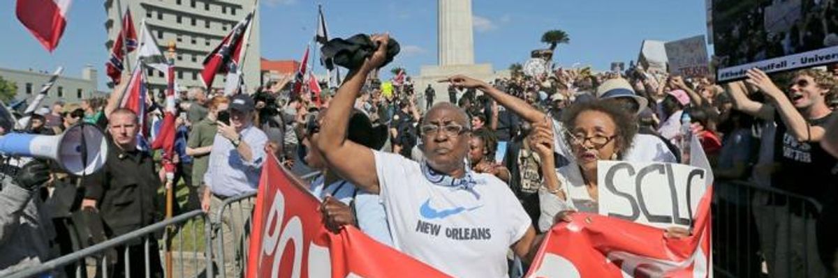 'Love Outnumbers Hate' as New Orleans Parade Confronts Confederate Statue Protectors