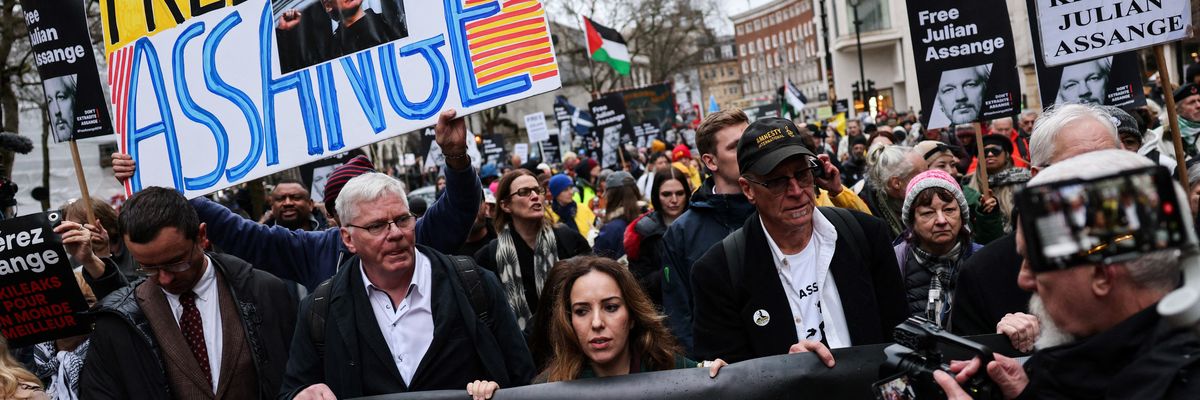 Assange supporters march in London