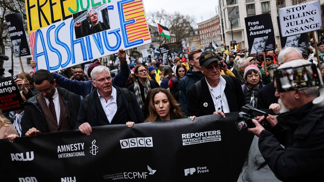 Assange supporters march in London