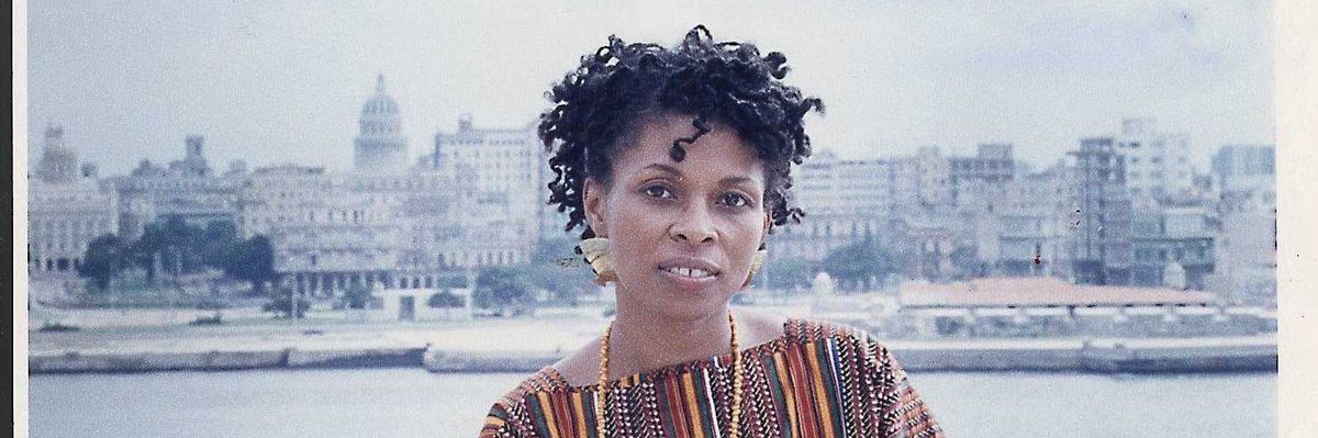 Assata Shakur with Havana in background.