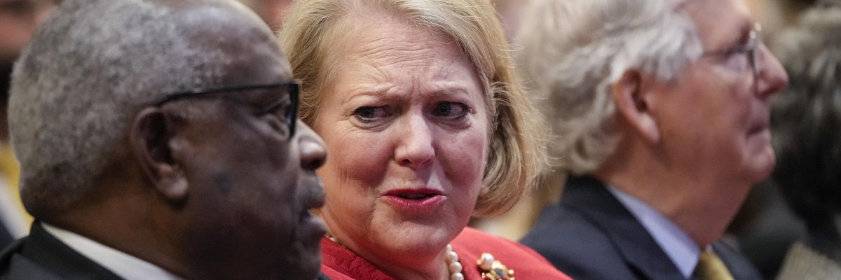 Associate Supreme Court Justice Clarence Thomas sits with his wife and conservative activist Virginia Thomas while he waits to speak at the Heritage Foundation on October 21, 2021 in Washington, D.C. (Photo: Drew Angerer/Getty Images)