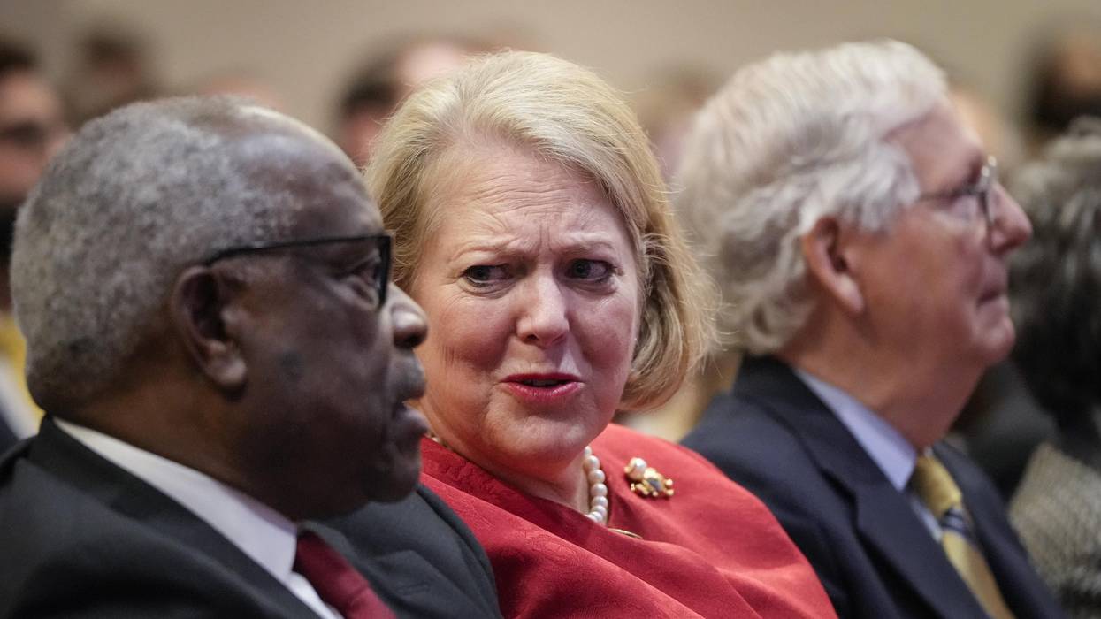 Associate Supreme Court Justice Clarence Thomas sits with his wife and conservative activist Virginia Thomas while he waits to speak at the Heritage Foundation on October 21, 2021 in Washington, D.C. (Photo: Drew Angerer/Getty Images)