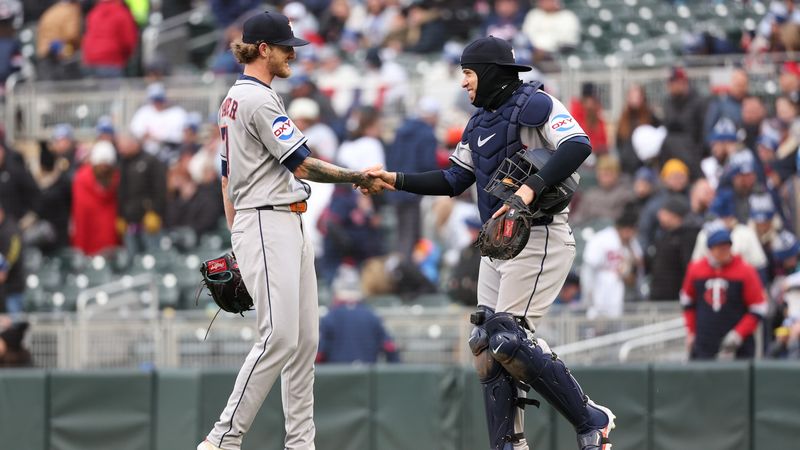 Astros shake hands with Occidental Petroleum label on their uniform sleeves.