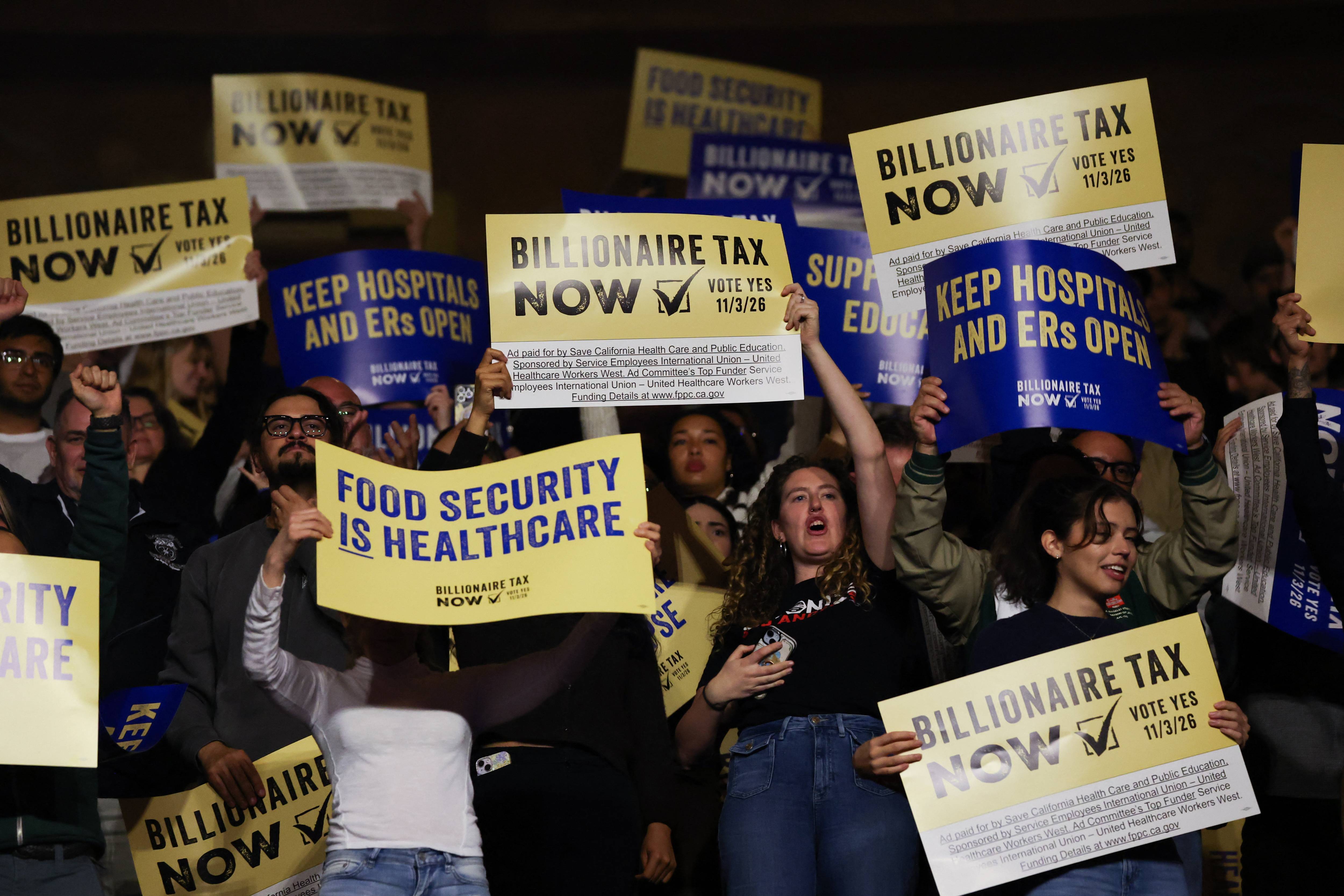 Attendees cheer during an event supporting the California Billionaire Tax Act