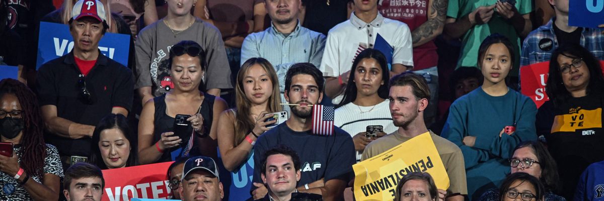 Attendees listen as President Joe Biden speaks during a rally in support of Democratic Senate candidate John Fetterman in Philadelphia on November 5, 2022.
