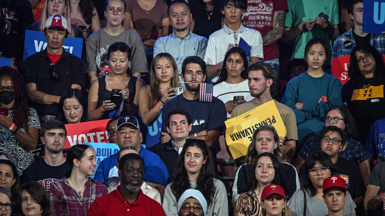 Attendees listen as President Joe Biden speaks during a rally in support of Democratic Senate candidate John Fetterman in Philadelphia on November 5, 2022.