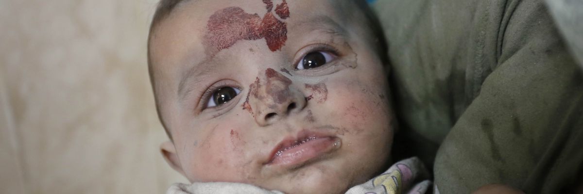 Baby injured in Israeli airstrikes is taken to Gaza's Suheda al-Aqsa Hospital