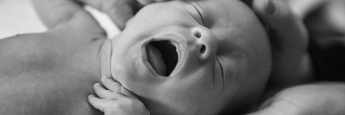Baby with open mouth.