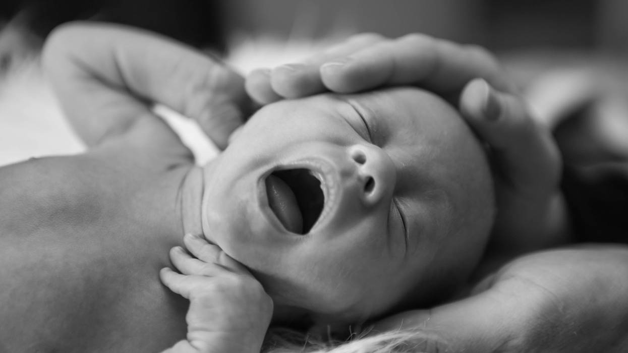 Baby with open mouth.
