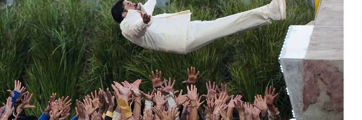 Bad Bunny flies into the arms of his dancers