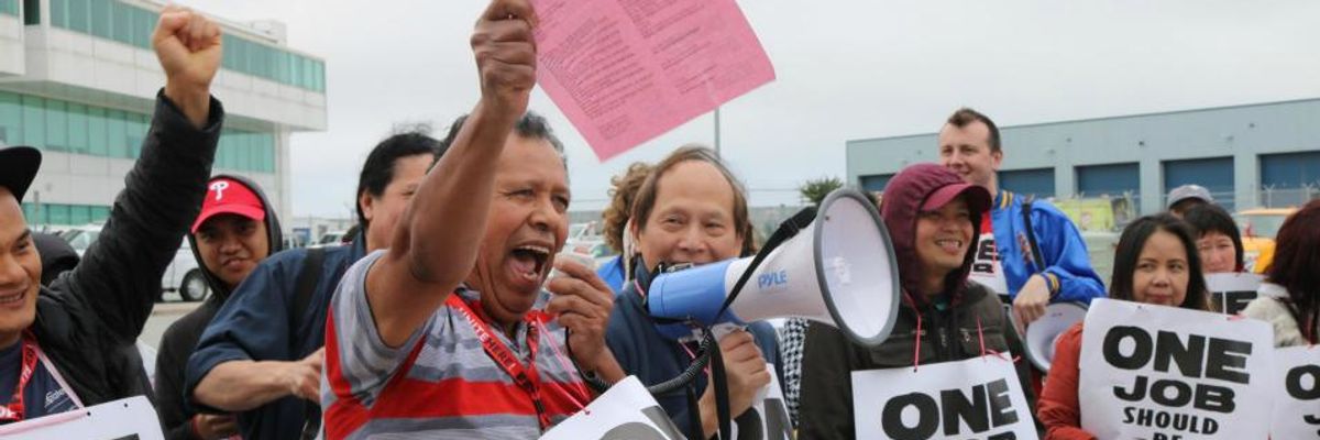 "We Won't Back Down": Over 50 Catering Workers Arrested at American Airlines HQ in Protest Against Poverty Wages