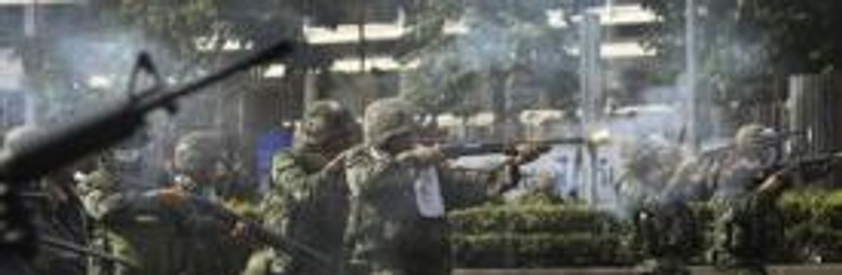 Thai Troops Fire on Redshirts as Crisis Escalates
